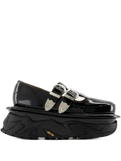 Toga Round Head Flat-soled Sandals In Black