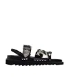 Toga Sandales Plates En Cuir Noir Avec Détails Métallisés In Black