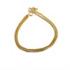 Token Jewelry La Mer Bracelet In Gold In Gold