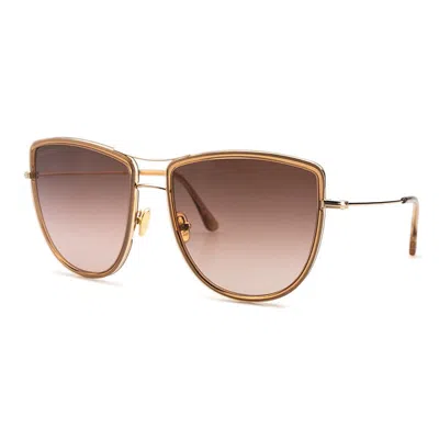 Tom Ford Aviator Full Rim, With A Gold Frame And Brown Lens.