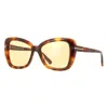 TOM FORD BUTTERFLY FULL RIM, WITH A SHINY BLONDE HAVANA FRAME AND PHOTOCHROMIC PEACH LENS.