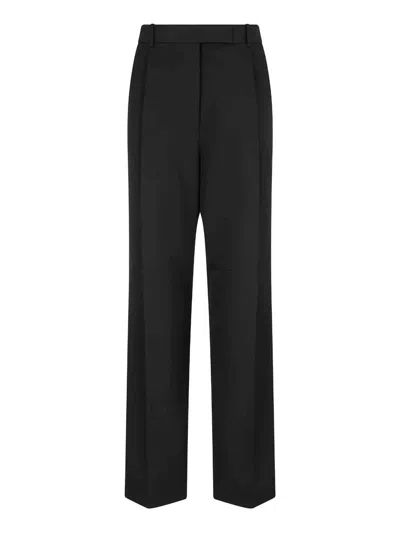 Tom Ford Pleated Wool Trousers In Black