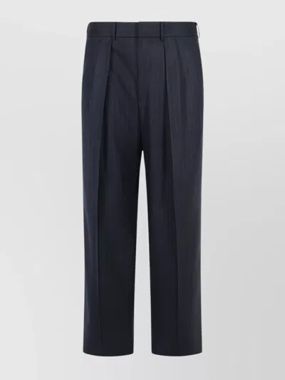 TOM FORD WOOL TROUSERS WITH PLEATED FRONT AND PINSTRIPE PATTERN