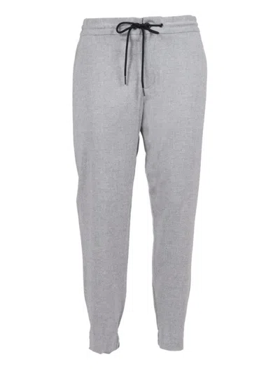 TOMBOLINI TAPERED FIT RUNNING PANTS WITH TEXTURED FABRIC