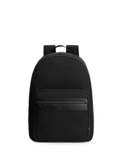 Tommy Hilfiger Logo-print Zipped Backpack In Black