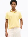 Tommy Hilfiger Regular Fit Tommy Wicking Polo In Citronella