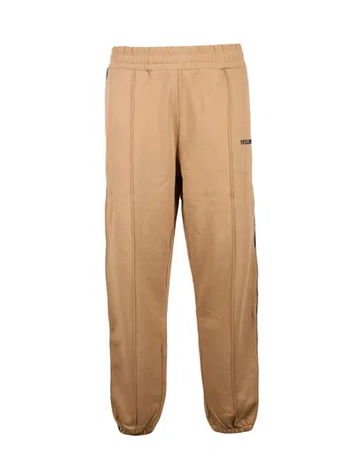 Tommy Hilfiger Relaxed Fit Tracksuit Bottoms With Contrast Stripe And Elastic Waistband In Multi