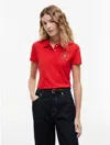 Tommy Hilfiger Slim Fit Metallic Script Monogram Polo In Fire Red