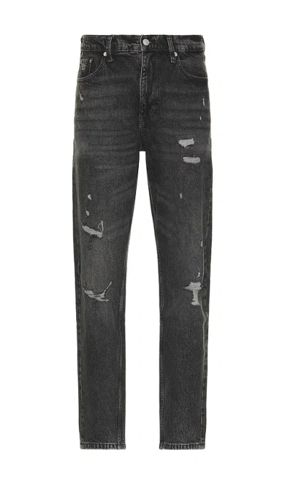 Tommy Jeans Isaac Relaxed Tapered Jeans In Black