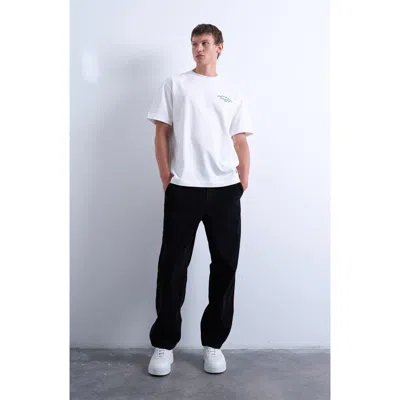 Topman Flat Front Tapered Cotton Corduroy Pants In Black