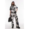 Topshop Distressed Geo Print Cotton Jumpsuit In Black Multi