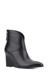Torgeis Notched Wedge Boot In Black