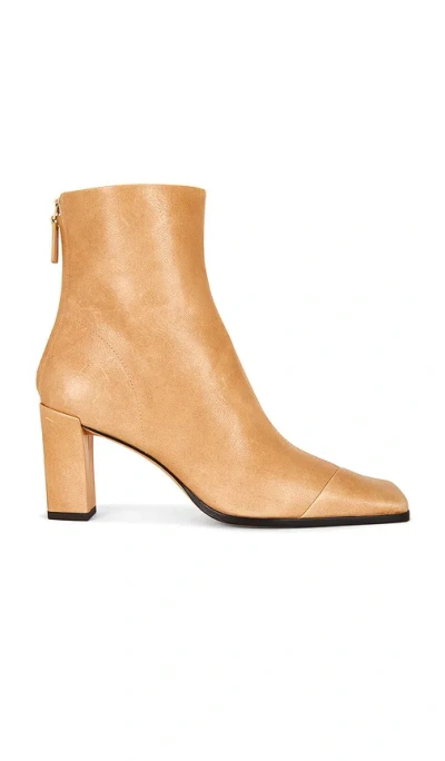 Tory Burch Asymmetric Cap Toe Ankle Boot In Sand