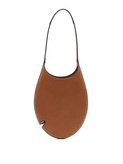 Tory Burch Pierced Small Bag Aged Tan In Sand