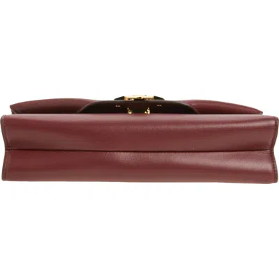 Tory Burch Charlie Leather Envelope Clutch In Cherry Brown