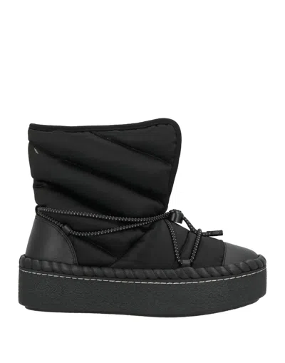 Tory Burch Fleece-lined Thick-soled Leather Boots In Black