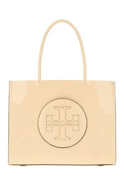 Tory Burch Handbags. In White