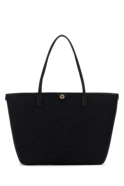 Tory Burch Handbags. In Black