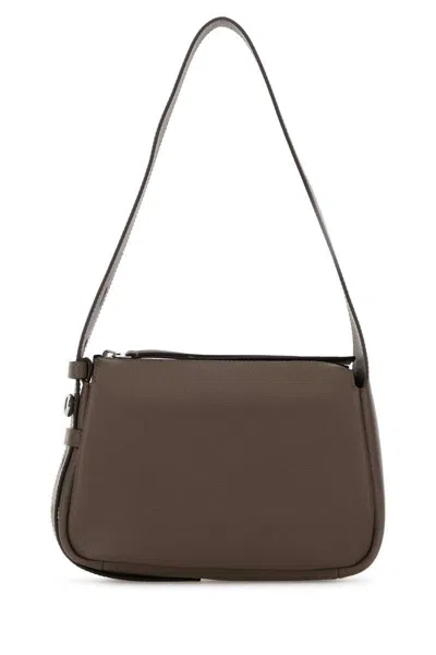 Tory Burch Handbags. In Brown