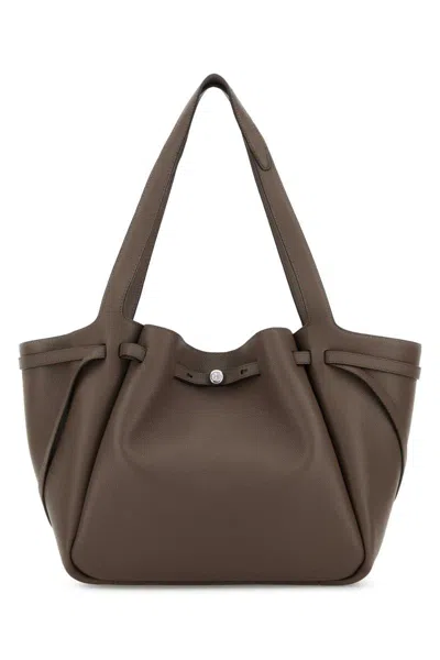 Tory Burch Handbags. In Brown