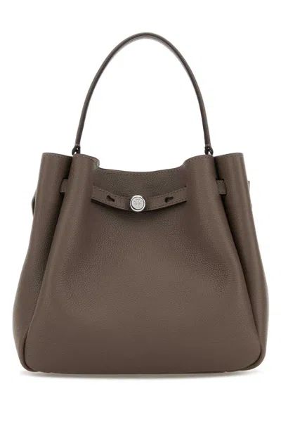 Tory Burch Handbags. In Brown