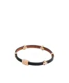 Tory Burch Hidden Clasp Bangle In Black