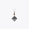 Tory Burch Hidden Logo Croc-embossed Key Charm In Black