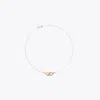 Tory Burch Interlocking Wishbone Pendant In Tory Gold/crystal