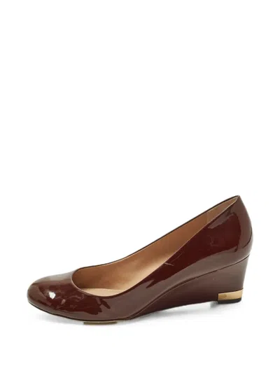 Pre-owned Tory Burch Leather Wedge Pumps In Brown