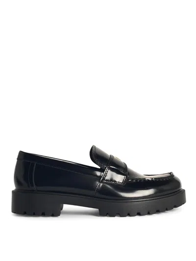 Tory Burch Lug Black Leather Loafers In Negro