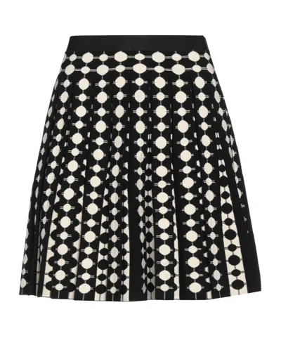 Tory Burch Mini Skirts In Black