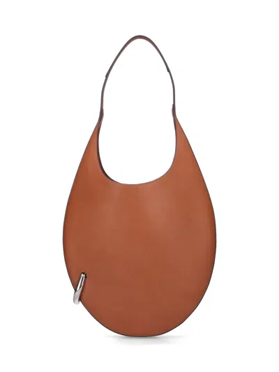 TORY BURCH PIERCED HOBO BAG