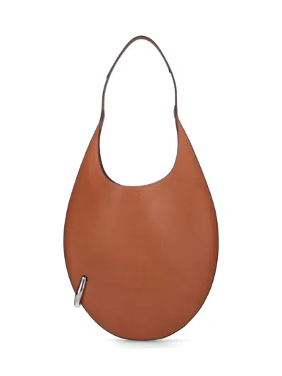 Tory Burch 'pierced ' Hobo Bag In Brown