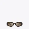 Tory Burch Pierced Oval Sunglasses In Brown