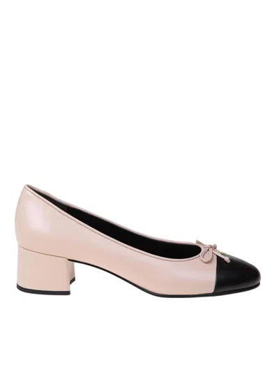 TORY BURCH LEATHER CAP-TOE PUMP WITH BOW
