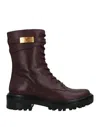 Tory Burch Solid Color Leather Boots In Black