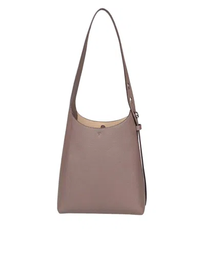 Tory Burch The Romy Small Hobo Bag Is Made Of Soft Hammered Leather In Brown
