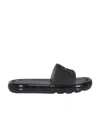 Tory Burch Transparent Sole Slides In Black