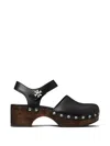 Tory Burch Turnlock Clogs In Black