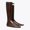 Tory Burch Twisted Riding Boot In Brown