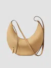 Tory Burch Pierced Leather Crossbody In Stone
