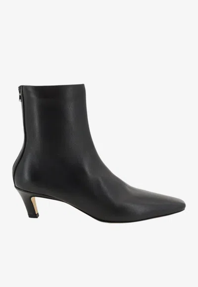 Totême 55 Pointed-toe Ankle Boots In Black