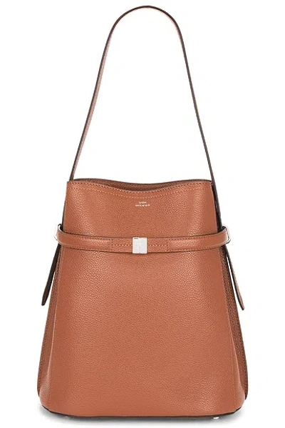 Totême Belted Grained Leather Bucket Bag In Brown