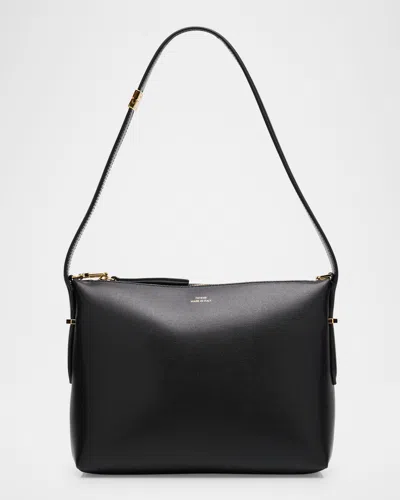 Totême Bevel Leather Wristlet Bag In Black