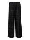 Totême Black Loose Pants With Monogram Print In Silk Woman In Multi