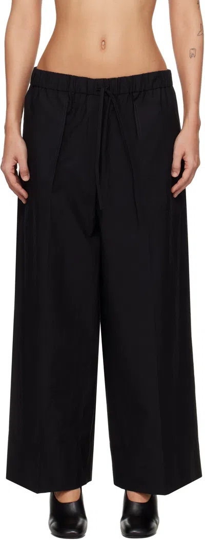 Totême Black Wide Summer Trousers