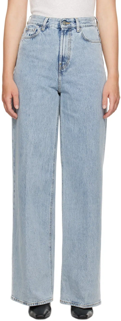 Totême Light Blue Wide Jeans With Logo Patch