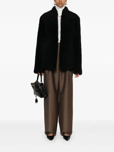 Totême Cinched Shearling Jacket In Navy In Black