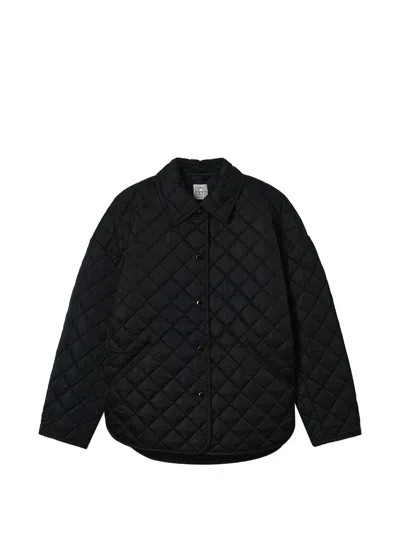 Totême Collared Quilted Jacket In Black