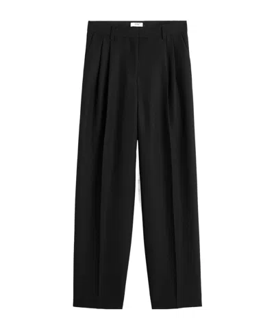 Totême Double-pleat Tailored Trousers In Black